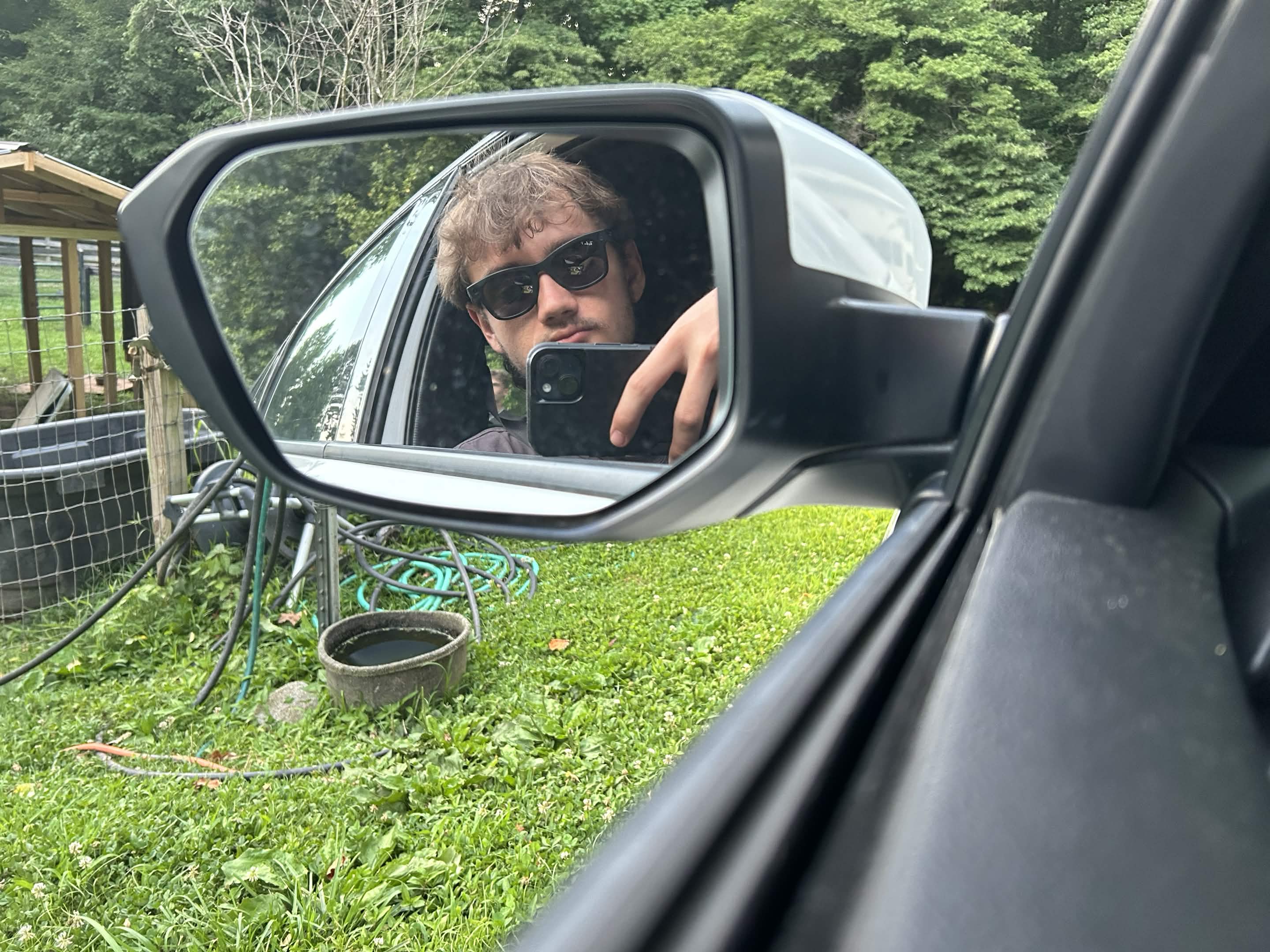 Tyler taking a mirror photo